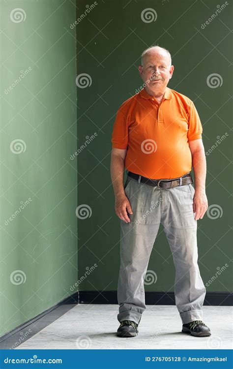 Full Length Portrait Of Grey Haired Senior Man With Mustache Wearing