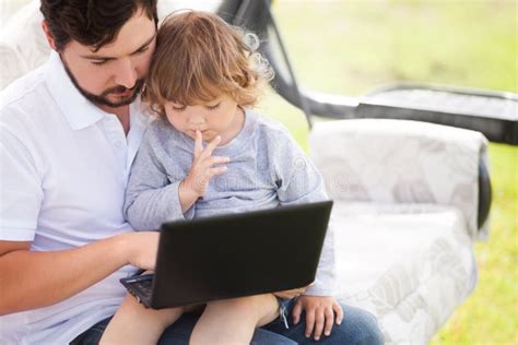 Father Teaching His Daughter Using Laptop Computer Stock Image Image