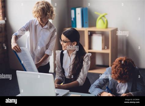 Blonde Boy Showing His Project To His Classmate Stock Photo Alamy