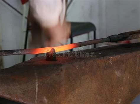 Blacksmith Hitting A Hot Red Metal With A Hummer Stock Video Video Of