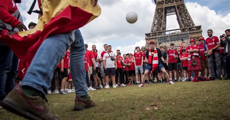 Tens of thousands of Liverpool fans turn Paris red | New Straits Times