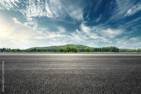 Asphalt Road And Mountain With Sky Clouds Landscape At Sunset Stock