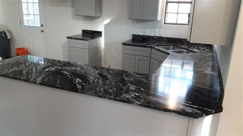 Black Forest Granite Countertops With White Cabinets