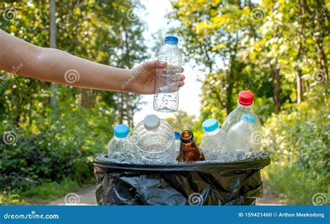 Collecting Plastic Bottles And Glass Bottles For Reuse Stock Photo