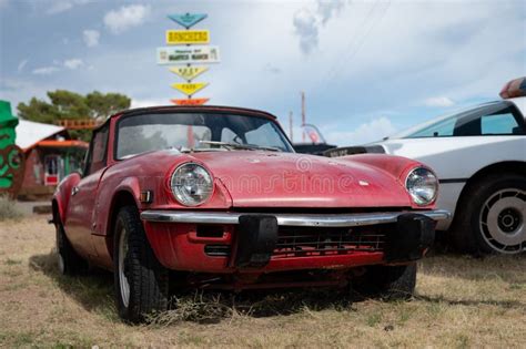 Old English Compact Sports Car Parked On The Grass It S A Red Triumph