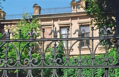 Wrought Iron Fence On Retaining Wall — Madison Art Center Design