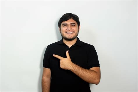 Premium Photo A Man Wearing A Black Shirt That Says He Is Smiling