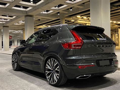 Black Volvo Xc40 With 22 Inch Wheels In A Parking Garage