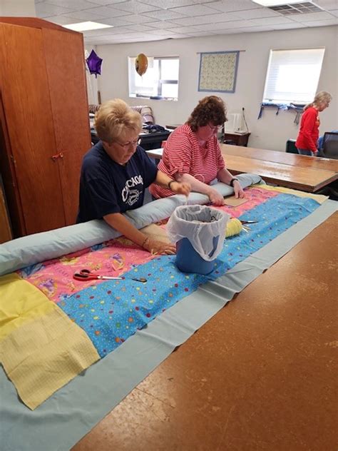 Local Church S Basement Quilting Group Reaches Goal Of Quilts For