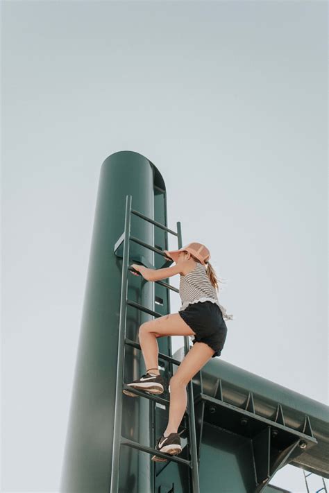 People Woman Climbing Ladder Person Image Free Photo