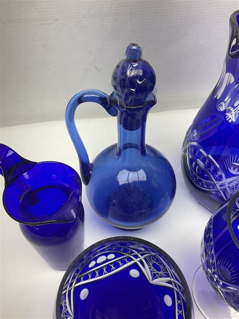 Bristol Blue Glass Jug Together With Blue Claret Jug Saucer Blue Cut