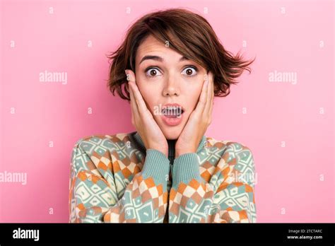 Photo Of Speechless Impressed Lady Arms Touch Cheekbones Open Mouth Staring Isolated On Pink