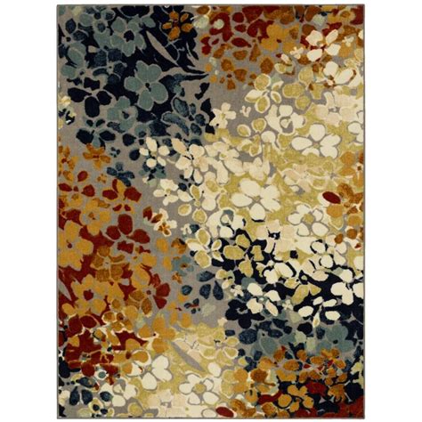 An abstract watercolor floral motif is artistically rendered in shades of blue and orange in the ...