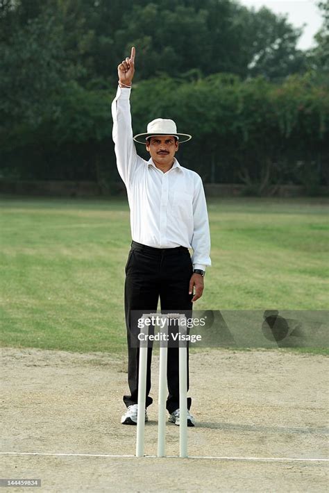 Cricket Umpire Signaling Out High-Res Stock Photo - Getty Images