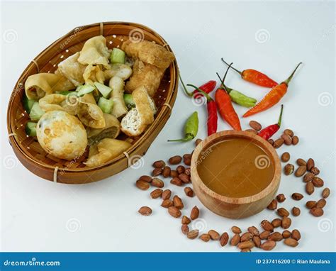 Batagor Or Fried Dumplings And Peanut Sauce With Cayenne Pepper And