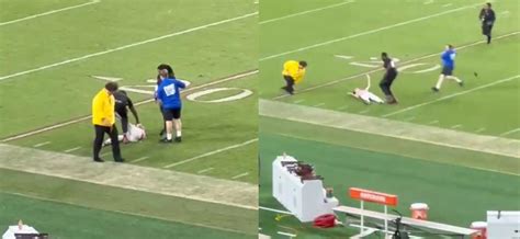 Fan Knocked Out Cold By Ncaa Security Dragged Off Field