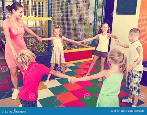 Kids Dancing with Teacher in School Class Stock Image - Image of ...