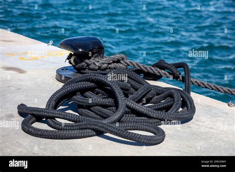 Mooring Rope And Bollard On Sea Water And Yachts Background Boat Heavy