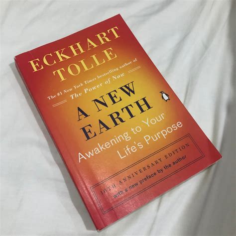 A New Earth By Eckhart Tolle On Carousell