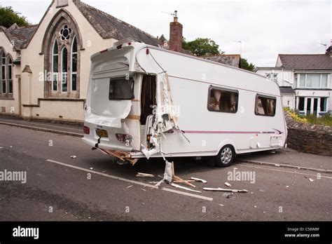 Damaged Caravan After Accident With Hgv Detached From Towcar After