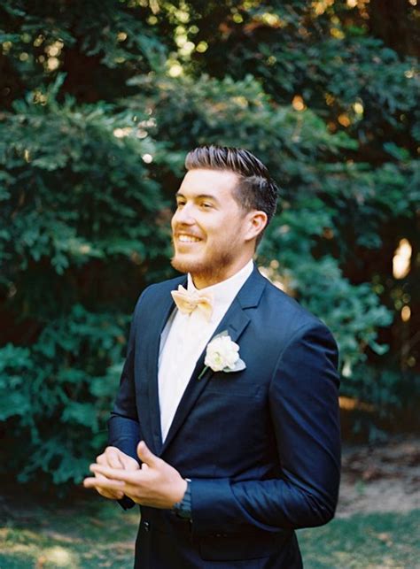 Classic Navy Blue Tuxedo With Bow Tie And Flower Lapel For Grooms