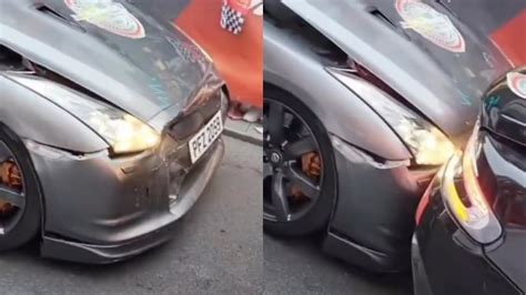 Una Nissan GTR Tampona Una Aston Martin DBS Ad Un Evento Di