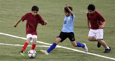 Students display football skills at Schools Olympic Programs | Team Qatar