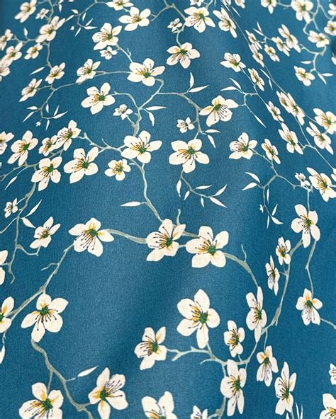 Tissu Coton Enduit Fleur d Amandier Bleu Pétrole Tissus et Nappes Westeel