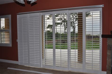 Sliding Shutters Bypass Is A Multiple Shutter Track System Contemporary Living Room