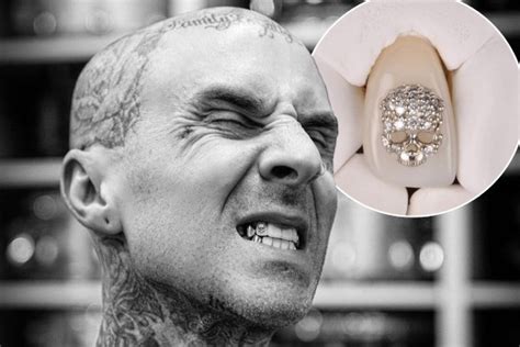 Travis Barker drops $8K on skull-shaped tooth gem