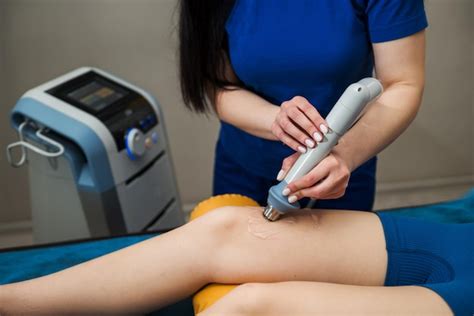 Premium Photo Extracorporeal Shockwave Therapy To Promote Healing Of