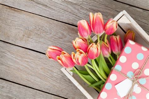 Premium Photo Colorful Tulips And Gift Box On Wooden Table