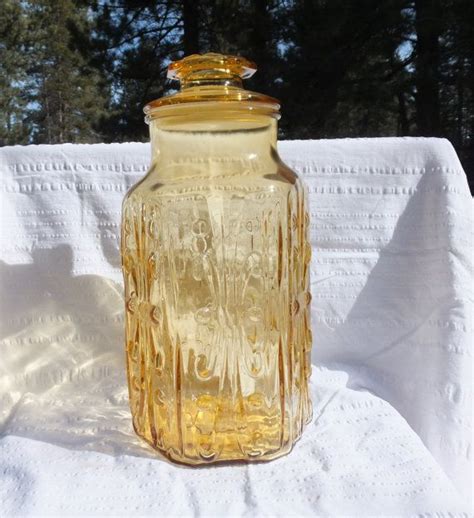 Vintage Amber Glass Jar With Lid And Pretty Scrolling Etsy Glass Jars With Lids Amber Glass