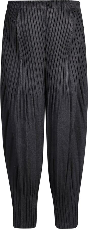 Issey Miyake Fully Pleated Tapered Leg Cropped Trousers ShopStyle