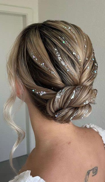 35 Enchanting Hairstyles For A Fairytale Wedding Glitter Twisted Low Updo