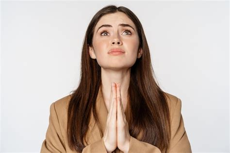 Premium Photo Hopeful Corporate Woman Student Praying Begging God