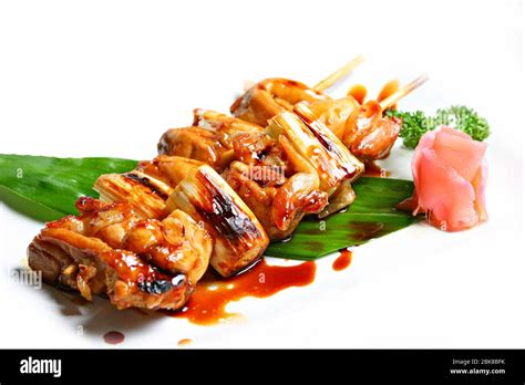 Charcoal Grilled Chicken Yakitori With Tare Sauce Japanese Food Style In White Background Stock