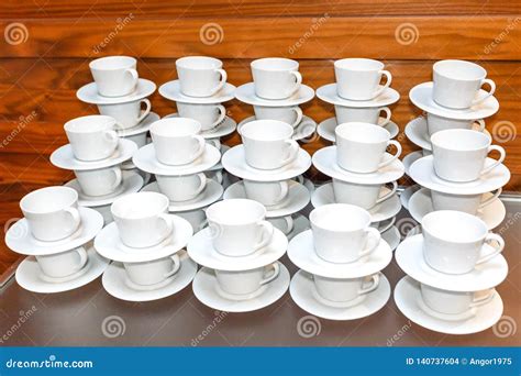 Many Empty White Tea Or Coffee Cups Stacked On Table Event Catering