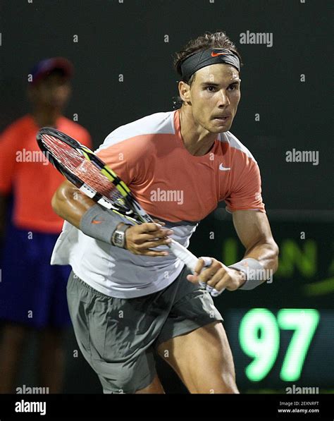 Spain S Rafael Nadal Competes Against Canada S Milos Raonic During The