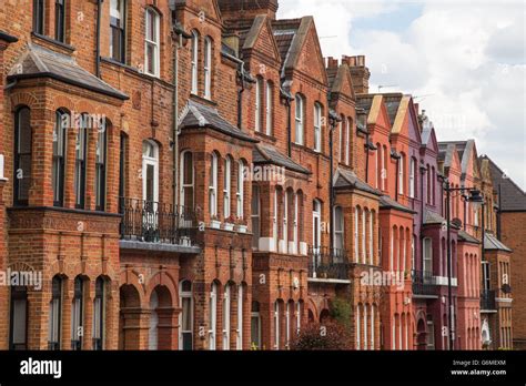 Exterior Of Victorian Red Brick Townhouse Facades On Baalbec Road In