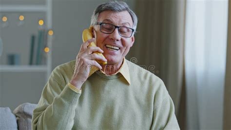 Portrait Funny Grandpa Retired Pretends To Speak Banana Like On Phone