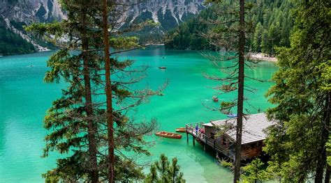 Free Photo: View of a Cabin by a Mountain Lake