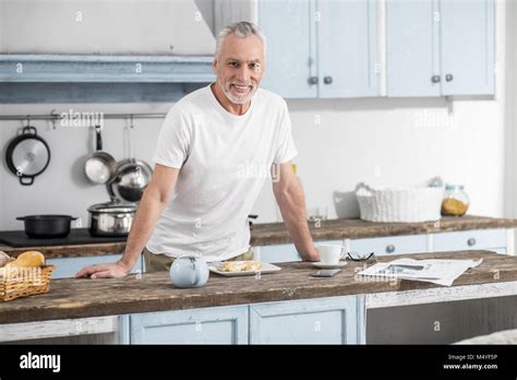 Positive Delighted Mature Man Looking At Camera Stock Photo Alamy