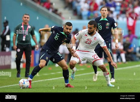 Australias Aziz Behich Left Ands Tunisias Naim Sliti Battle For The