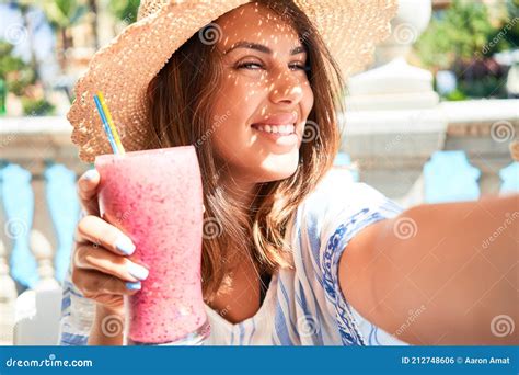 Beutiful Woman Sitting At Pool Bar On Hotel Resort Drinking Healthy