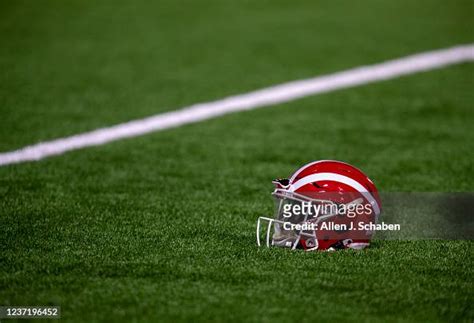 Mater Dei football helmet rests on the turf before the game with San ...