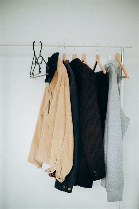 Clothes Hanging on Hangers · Free Stock Photo