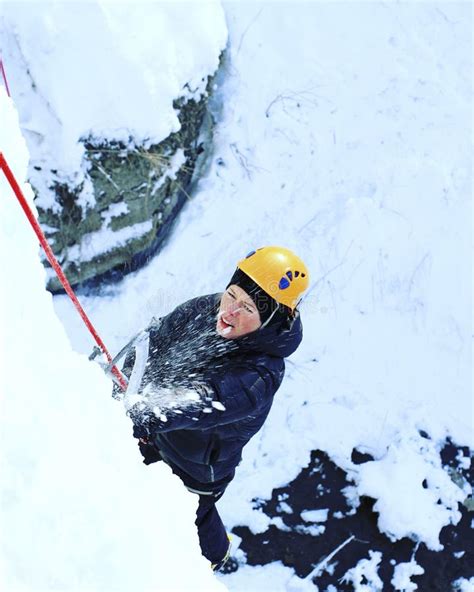 Man Climbing Frozen Waterfall Stock Photo Image Of Extreme Cold