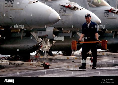 Us Navy Acting As The Starboard Wing Safety Observer Airman Walks