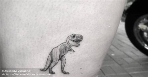 Cute Micro T Rex Tattoo On The Thigh